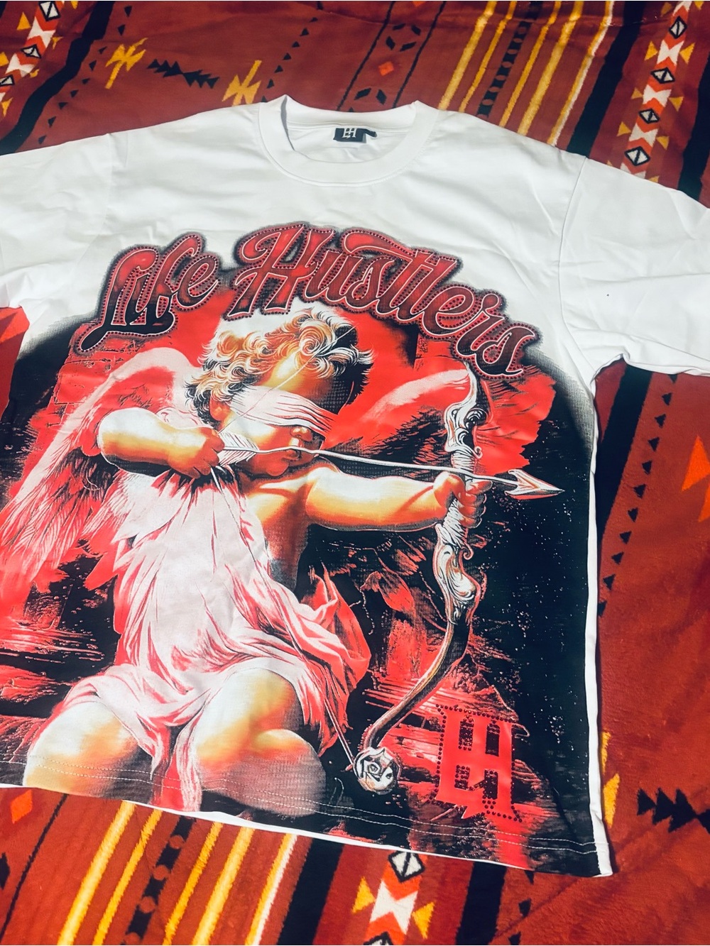 Life Hustlers White Graphic Tee with Red Cherub Design
